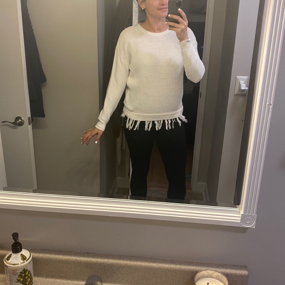 Knit sweater.